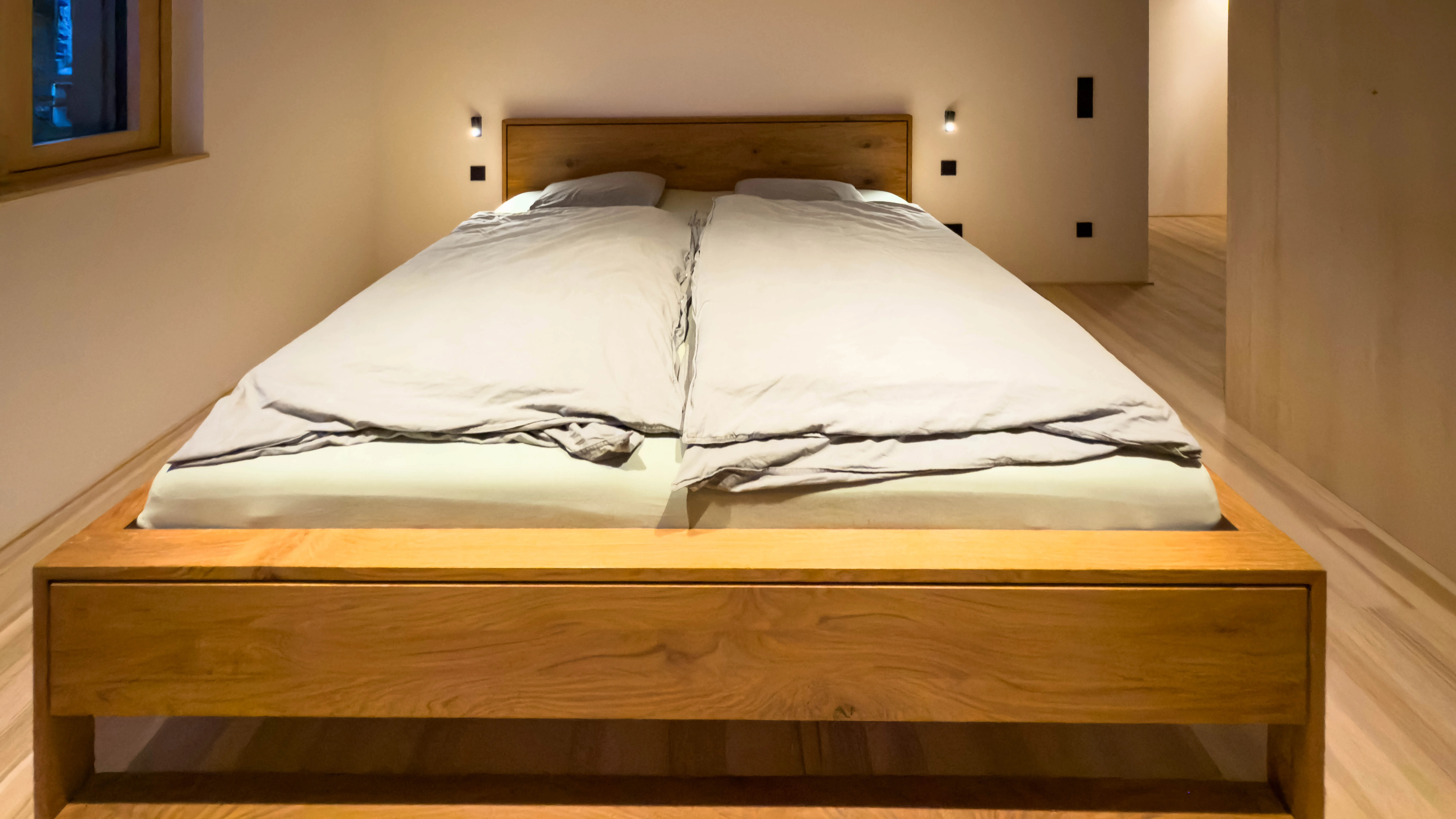 Beleuchtung Schlafzimmer mit Wandleuchten. Referenz Ulmer
